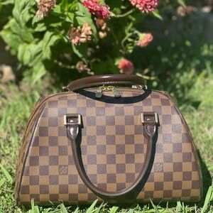 💕💯Authentic Louis Vuitton Rivera💕